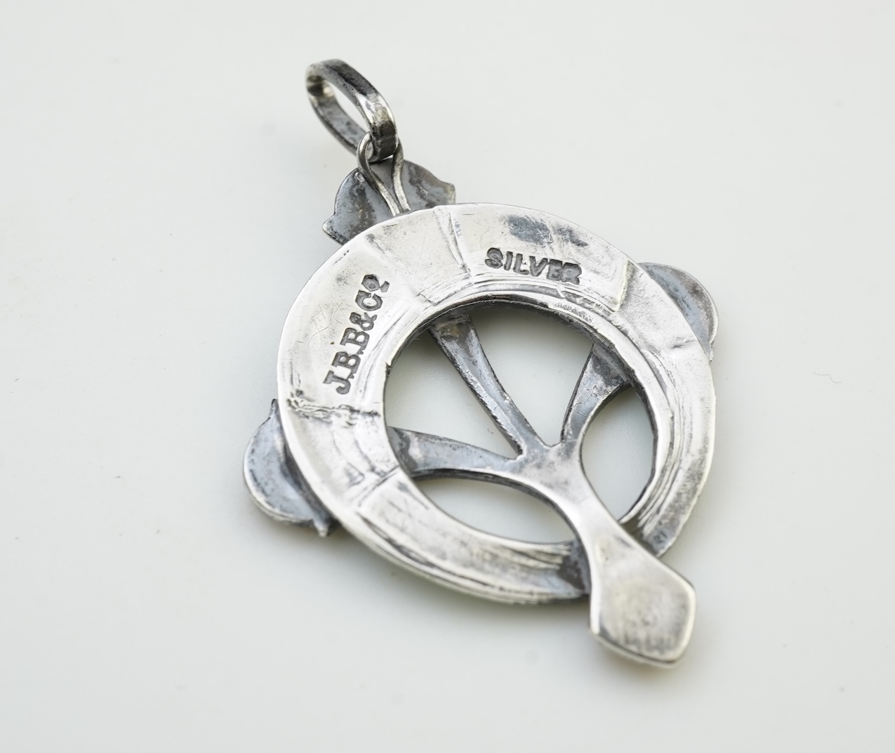 John Baker Bennett & Co., an Arts & Crafts silver and enamel pendant, circa 1905